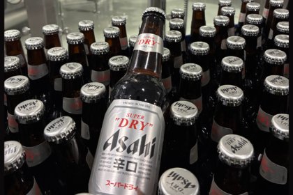 Asahi Super Dry bottles on bottling line