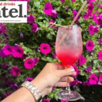 Spritz serve with a garden backdrop