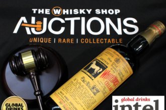 Bottle of White Horse whisky with hammer and gavel