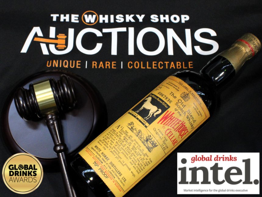 Bottle of White Horse whisky with hammer and gavel
