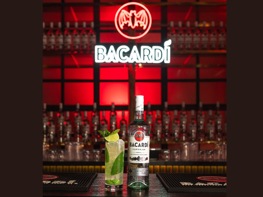 Bacardi bottle and serve on a bar