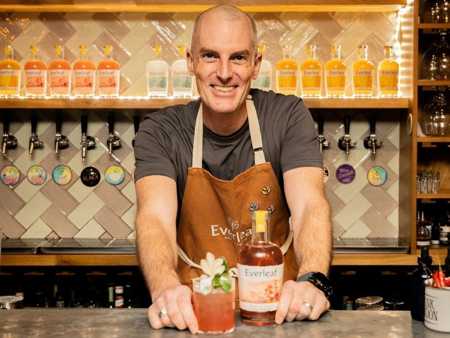 Everleaf founder Paul Mathew behind a bar