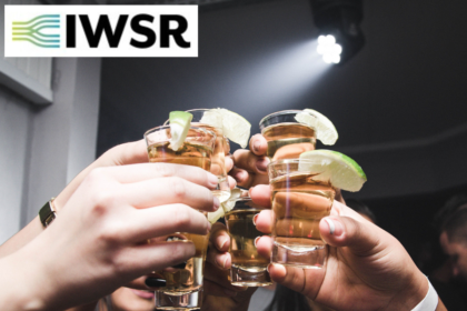 Tequila shots raised in a toast
