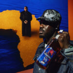 Prince Gyasi with Martell bottle