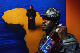 Prince Gyasi with Martell bottle