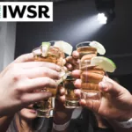 Tequila shots raised in a toast