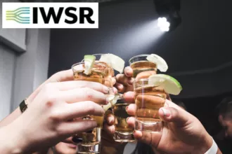 Tequila shots raised in a toast